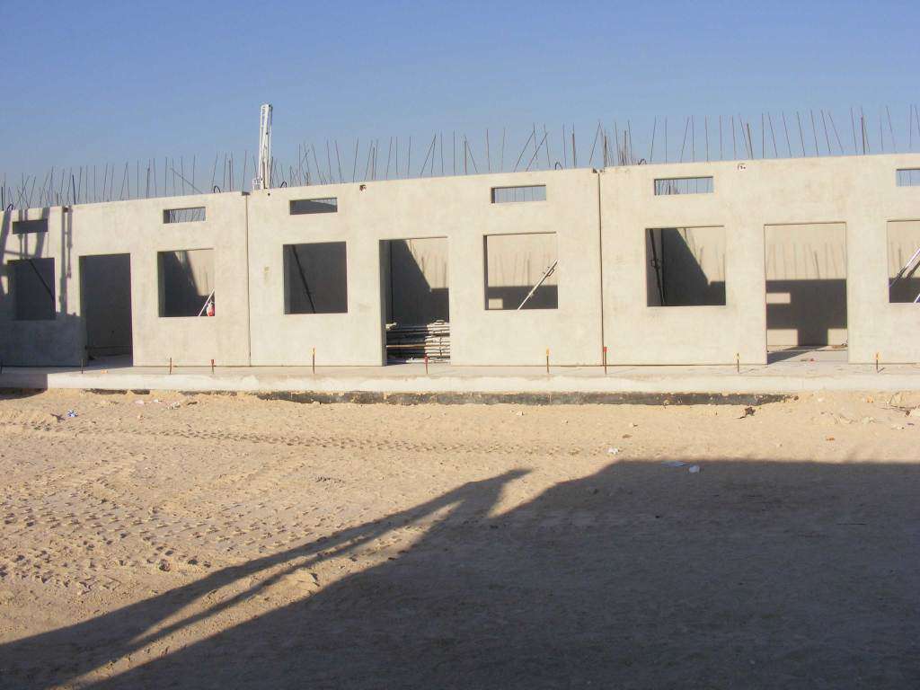 Wall-panels-gallery-3 Precast concrete wall panels installed at building construction site