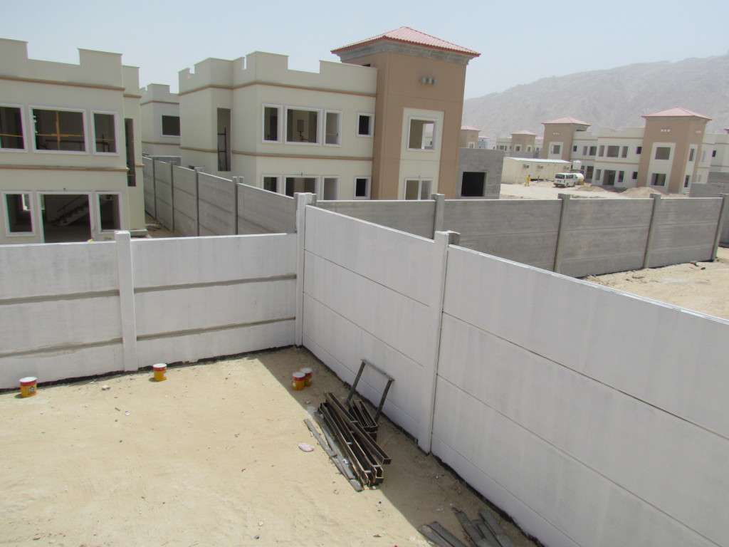 boundry-wall-gallery-3 Precast concrete boundary walls installation in residential housing development with multi-level design