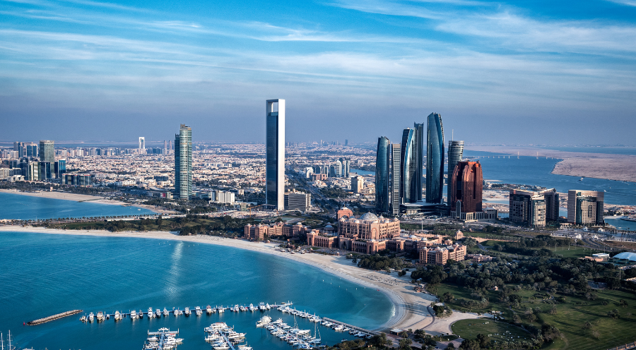 a wide angle image of Abu Dhabi city capturing the buildings and sea view