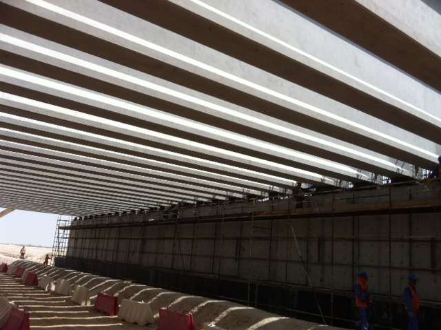I Girder beams ( Weight 53 ton )-3 Precast beams and columns forming a bridge structure at a construction site.