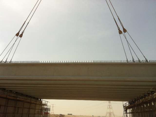 I Girder beams ( Weight 53 ton )-6 Precast beams and columns being lifted and installed for a bridge structure.