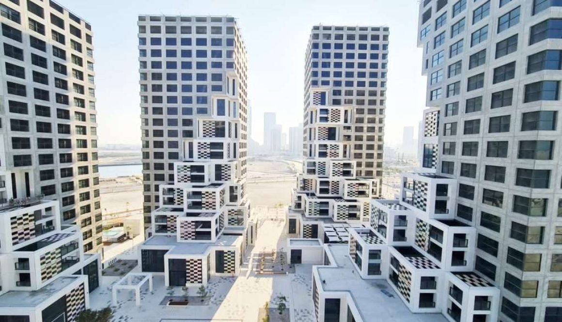 the Makers District residential towers in Abu Dhabi featuring modern geometric architecture and skyline views